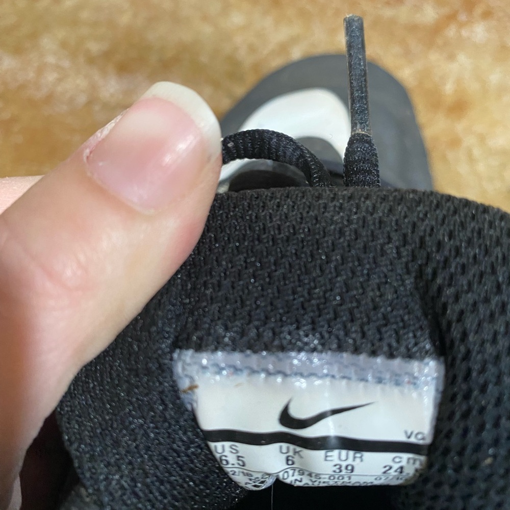 Boys Nike vapor baseball cleats.